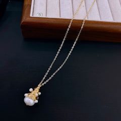 Gold Wrapped Pearl Necklace